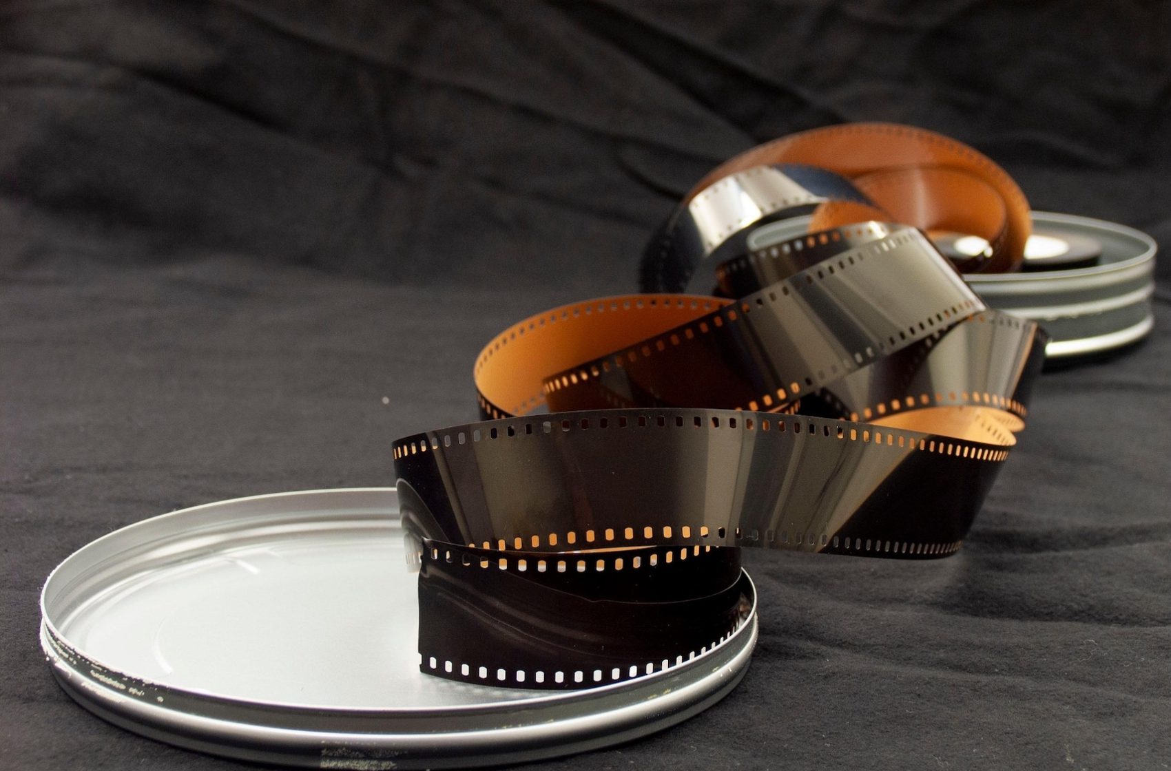 movie film roll next to canister
